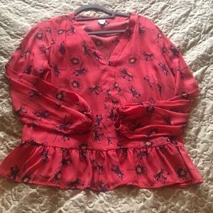 Pink floral blouse with gathered cuffs and peplum